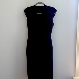 Karen Millen Dress. Size 8.  Black, form fitting & is a versatile, elegant style
